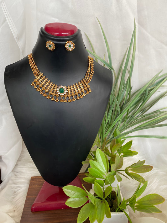 Golden Necklace Set With Green Stone