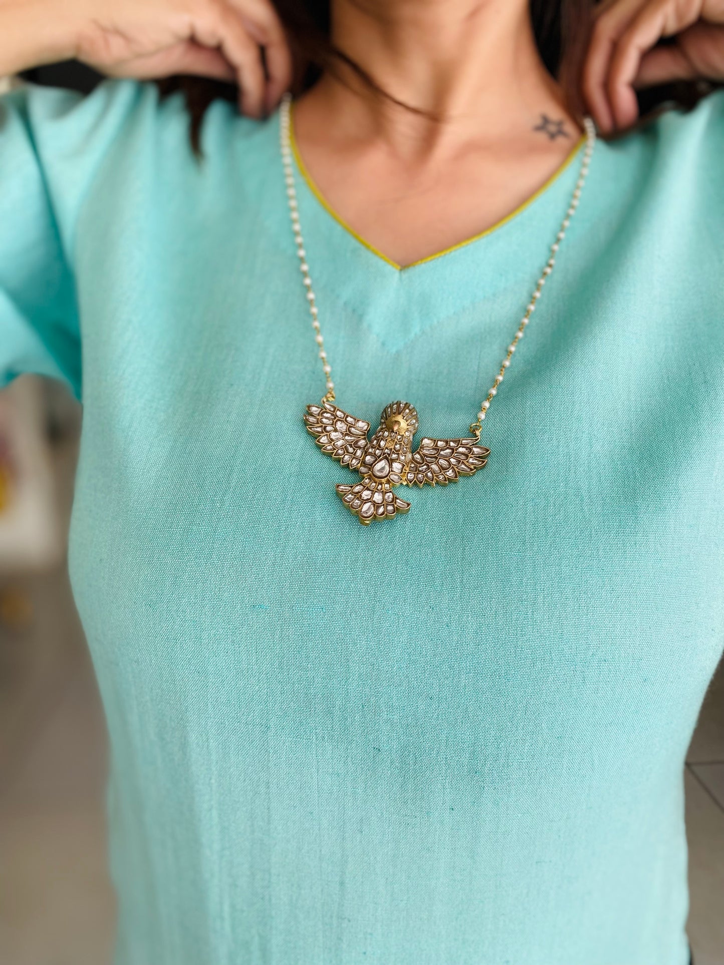 Aarohini wings pendant